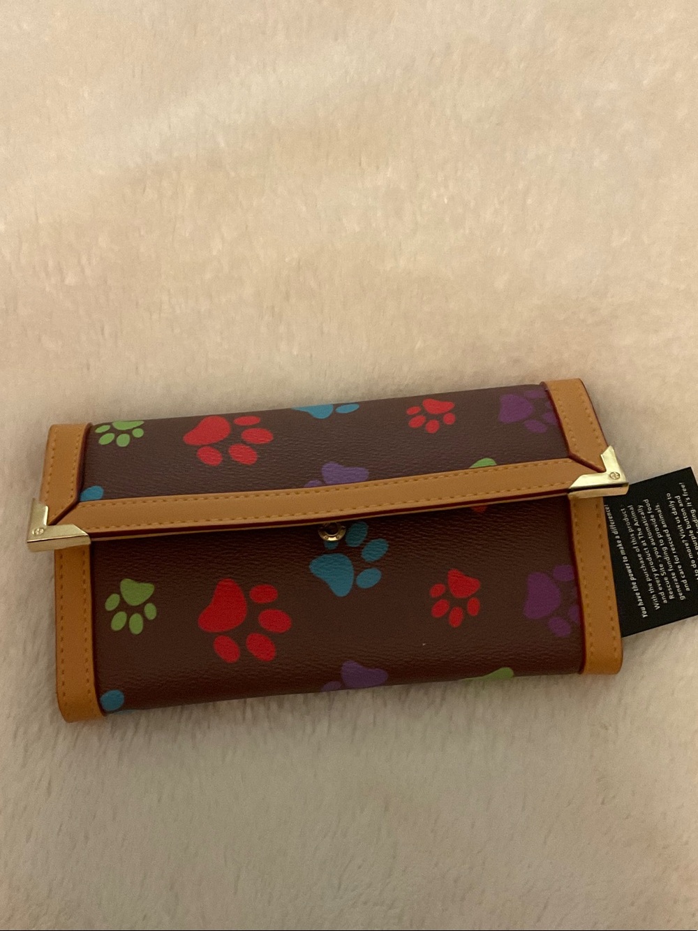 Brown Paw Print Animal Rescue Site Trifold Wallet with Tan Trim